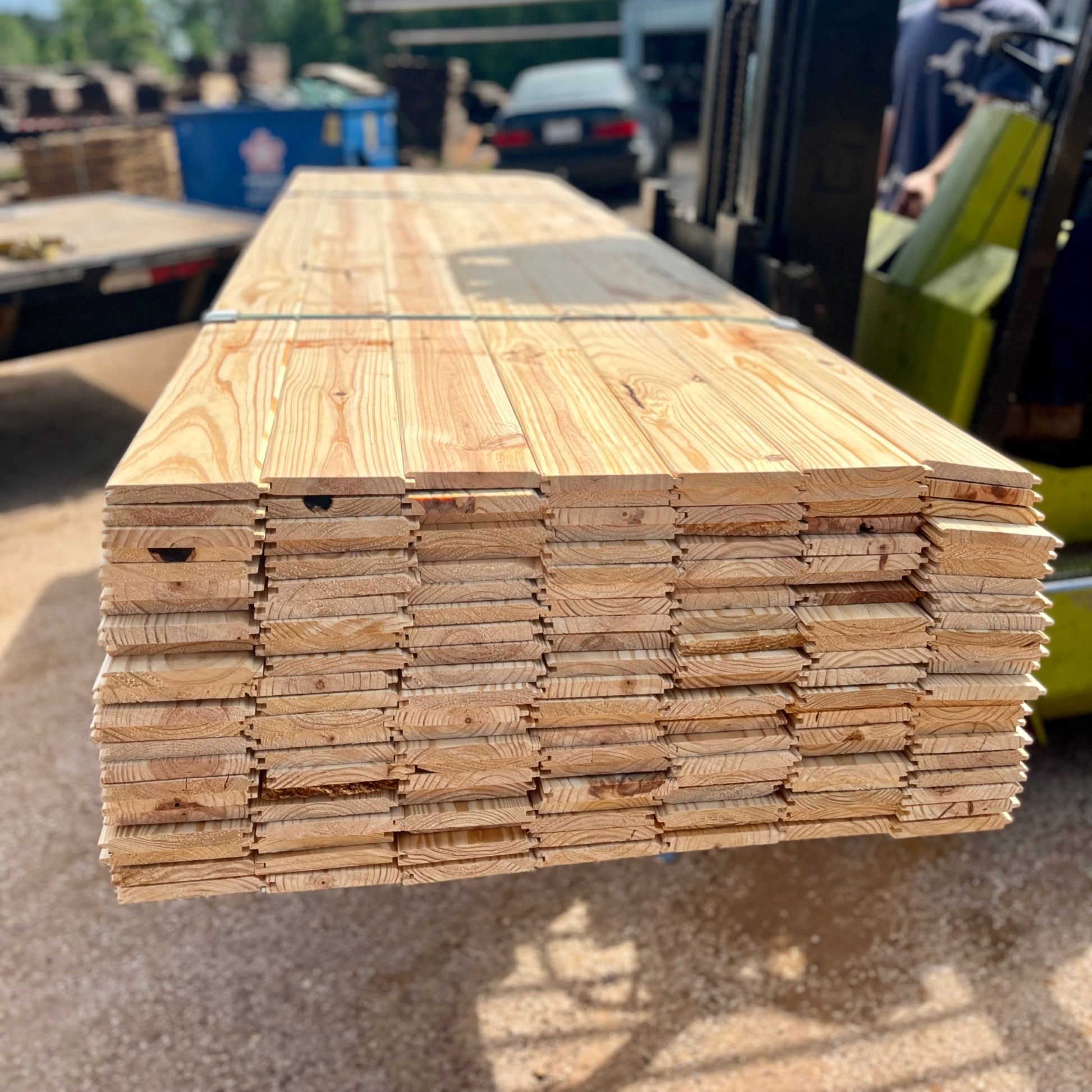 Forklift Loading a Customer with 1x6x10' V-Groove Wall Paneling